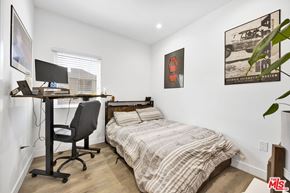 Los Angeles apartment for rent - A bedroom with a bed, desk, and chair.