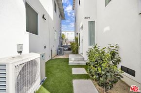 Los Angeles apartment for rent - A white building with the number 3004 on it.