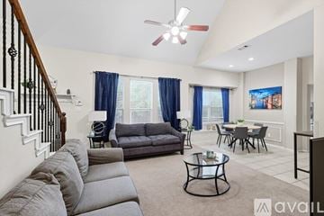 Dallas house for rent - A living room with a grey couch and a black coffee table.