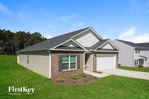 Lexington house for rent - A house with a garage and a driveway is for sale by FirstKey Homes.
