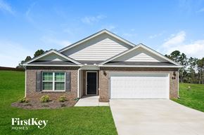 Lexington house for rent - A house with a garage and a driveway is shown.