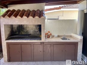 Doral house for rent - A dining room with a glass table and chairs.