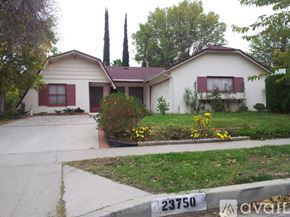Los Angeles house for rent - A bathroom with a sink, toilet, and shower.