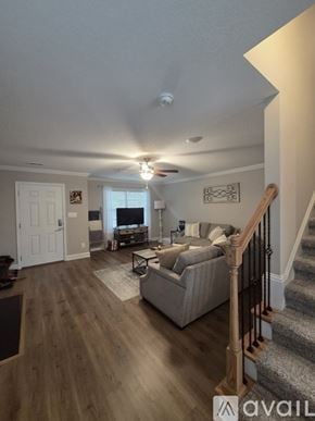 Knoxville house for rent - A kitchen with a granite countertop and stainless steel appliances.