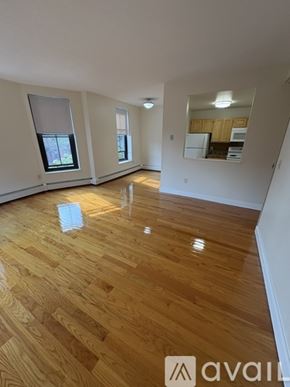 Boston apartment for rent - A room with wooden flooring and a window.