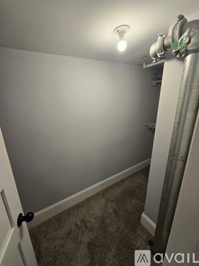 Kalamazoo apartment for rent - A room with a door and a light on the ceiling.