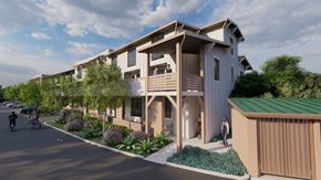 Santa Barbara apartment for rent - A modern apartment complex with a green roof and a bicycle parked outside one of the units.