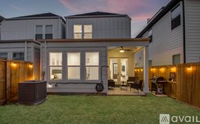 Houston townhouse for rent - A house with a patio and a hot tub.