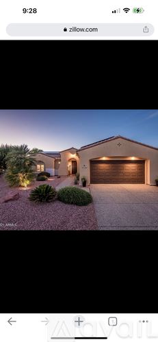 Sun City West house for rent - A house with a driveway and a garage is shown.