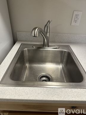 Palmer apartment for rent - A stainless steel kitchen sink with a single faucet.