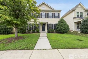 Morrisville house for rent - A house with a tree in front of it.
