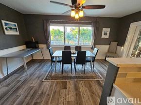 Oakland Park house for rent - A dining room with a table set for four.