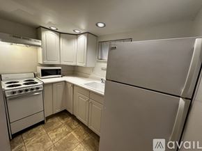 Seattle townhouse for rent - A room with a tiled floor and a wall-mounted shelf.