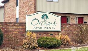 Muncie apartment for rent - A room with a carpeted floor and a window letting in natural light.