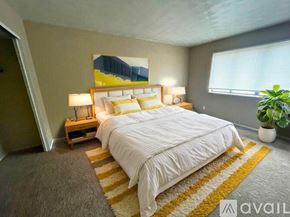 Muncie apartment for rent - A room with a white door and a grey wall.