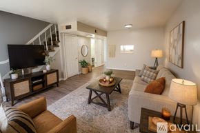 Muncie apartment for rent - A room with a carpeted floor and a white door.