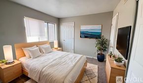 Muncie apartment for rent - A room with a carpeted floor and a window.