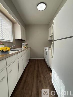 Muncie apartment for rent - A bathroom with a toilet, sink, and bathtub.