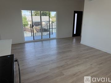 Los Angeles house for rent - A kitchen under construction with cabinets and appliances in place.