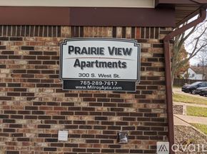 Milroy apartment for rent - A sign for Prairie View Apartments is mounted on a brick wall.