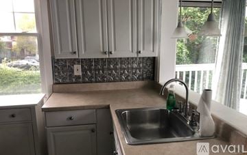 Pittsburgh house for rent - A kitchen with a sink and a window.