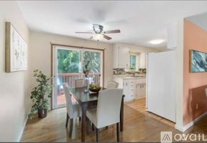 Auburn apartment for rent - A dining room with a table and chairs is shown.