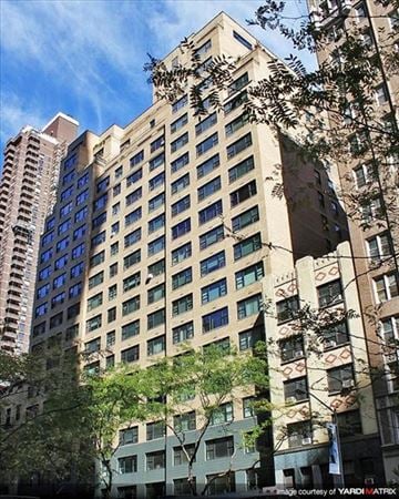 New York apartment for rent - a tall building with trees in front of it
