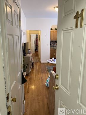 Boston apartment for rent - A hallway with a door on the right and a door on the left.