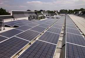 Lawrence apartment for rent - solar panels on the roof of a building