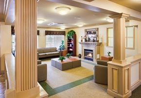 Rahway apartment for rent - a living room with a fireplace and columns