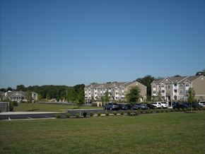Mount Royal apartment for rent - a row of houses on the side of a parking lot