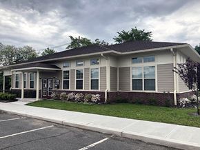 North Brunswick apartment for rent - a house with a sidewalk in front of it