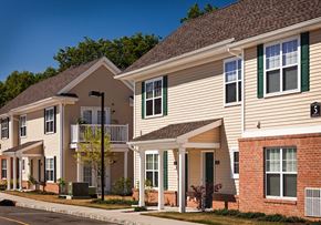 Toms River apartment for rent - a row of town houses on the side of a street