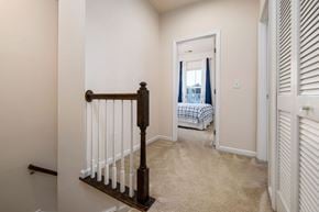 Cary house for rent - A bedroom with a bed and a window.
