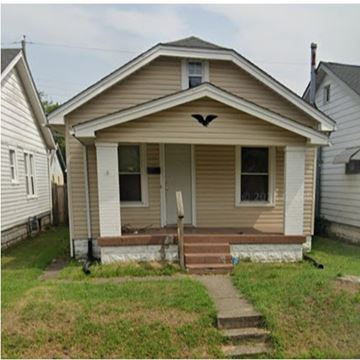 Louisville house for rent - A small house with a front porch and a door.