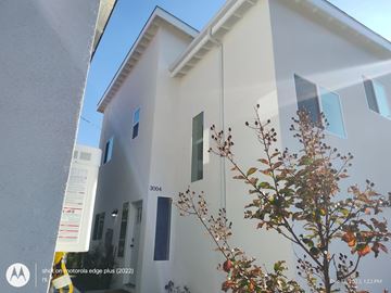 Los Angeles apartment for rent - A white building with the number 3004 on it.
