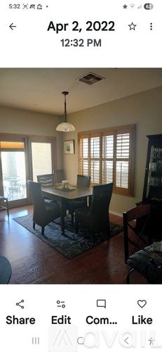 Phoenix house for rent - A dining room with a table and chairs.