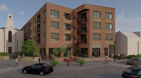 Philadelphia apartment for rent - A building with cars parked in front and people walking.