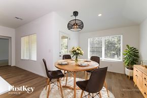 Oklahoma City house for rent - A dining room with a round table and chairs.