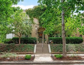 Denver apartment for rent - A house with a green tree in front of it.