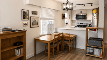 Vancouver apartment for rent - A kitchen area with a table and chairs.