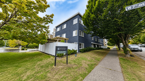 Vancouver apartment for rent - A blue building with a sign that says "W 7th Ave" in front of it.