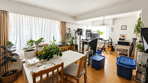 Vancouver apartment for rent - A room with a table, chairs, and plants.