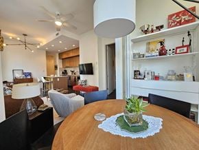 Vancouver apartment for rent - A dining room with a wooden table and chairs.