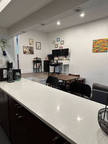Vancouver apartment for rent - A kitchen with a counter and chairs.