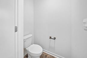 Lithopolis house for rent - A white toilet in a small bathroom.