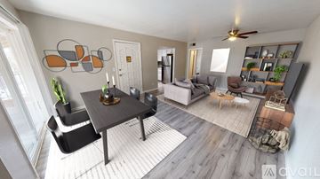 Phoenix apartment for rent - A modern living room with a dining table and chairs.
