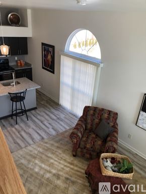 Waukesha apartment for rent - A kitchen with a counter and a chair.