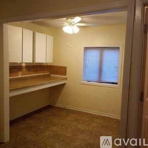 Saint Paul apartment for rent - A room with a window and a fan.