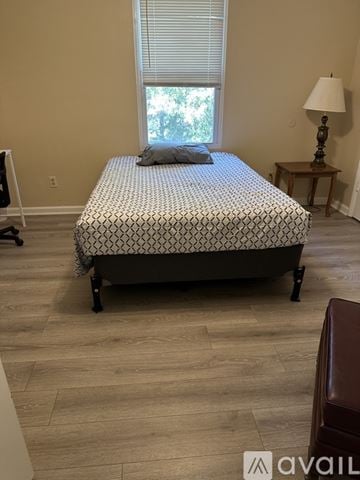 Nashville apartment for rent - A kitchen with white appliances and cabinets.